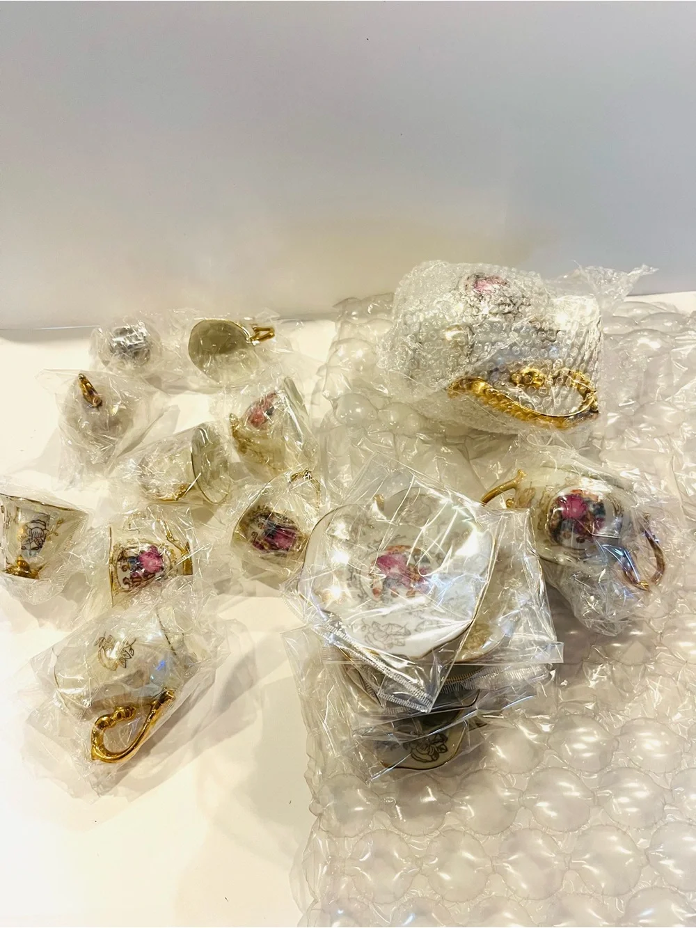 vintage porcelain tea service set from Japan features an iridescent finish